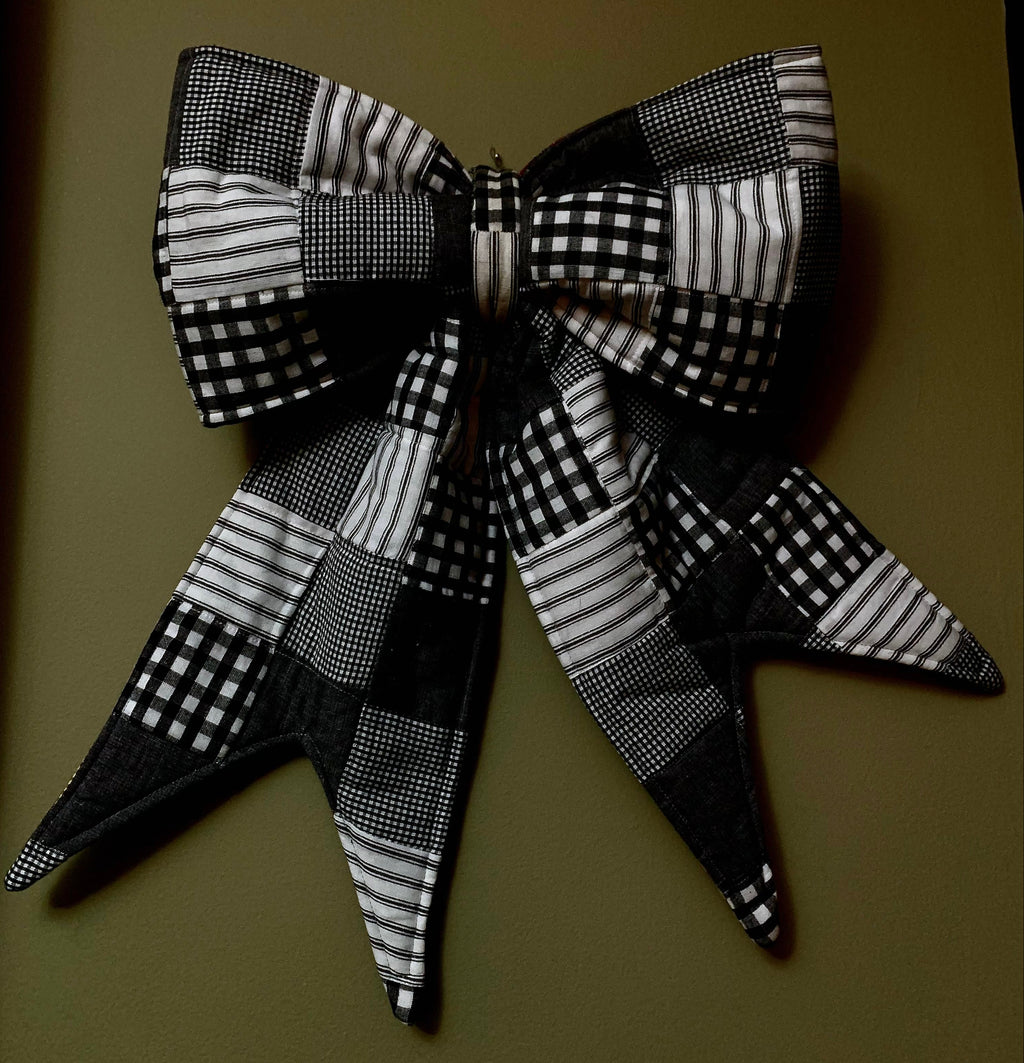 Giant bow with black and white patchwork fabric