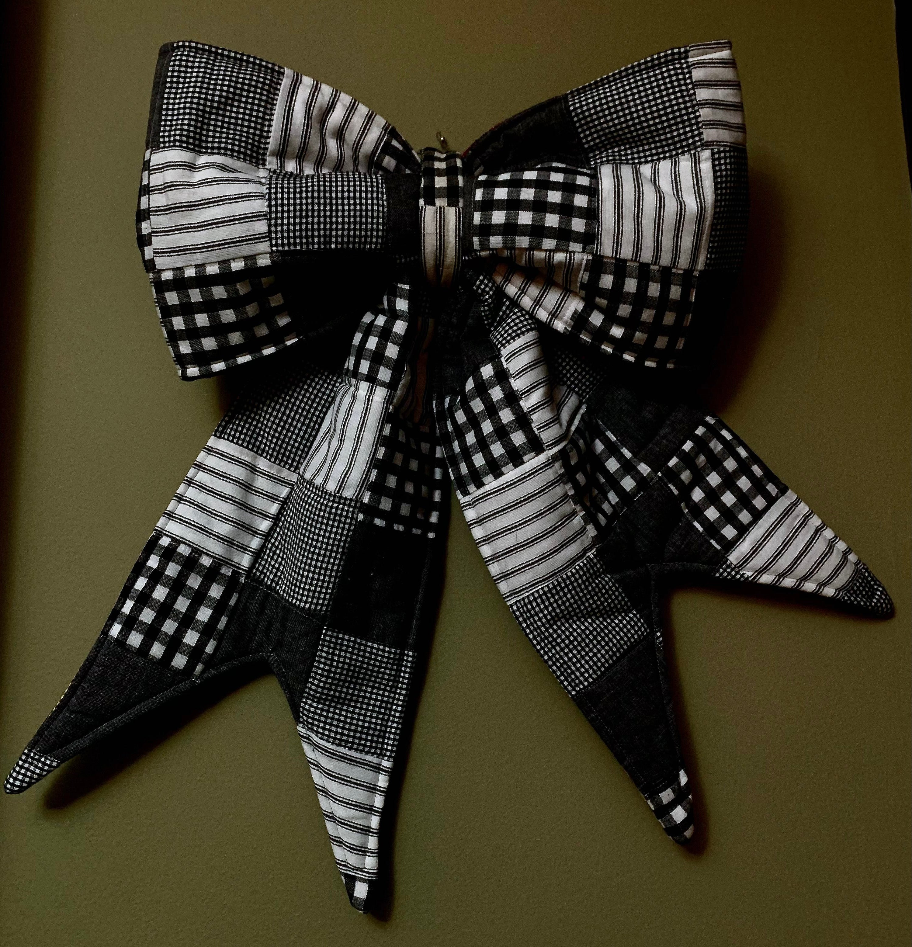 Giant bow with black and white patchwork fabric