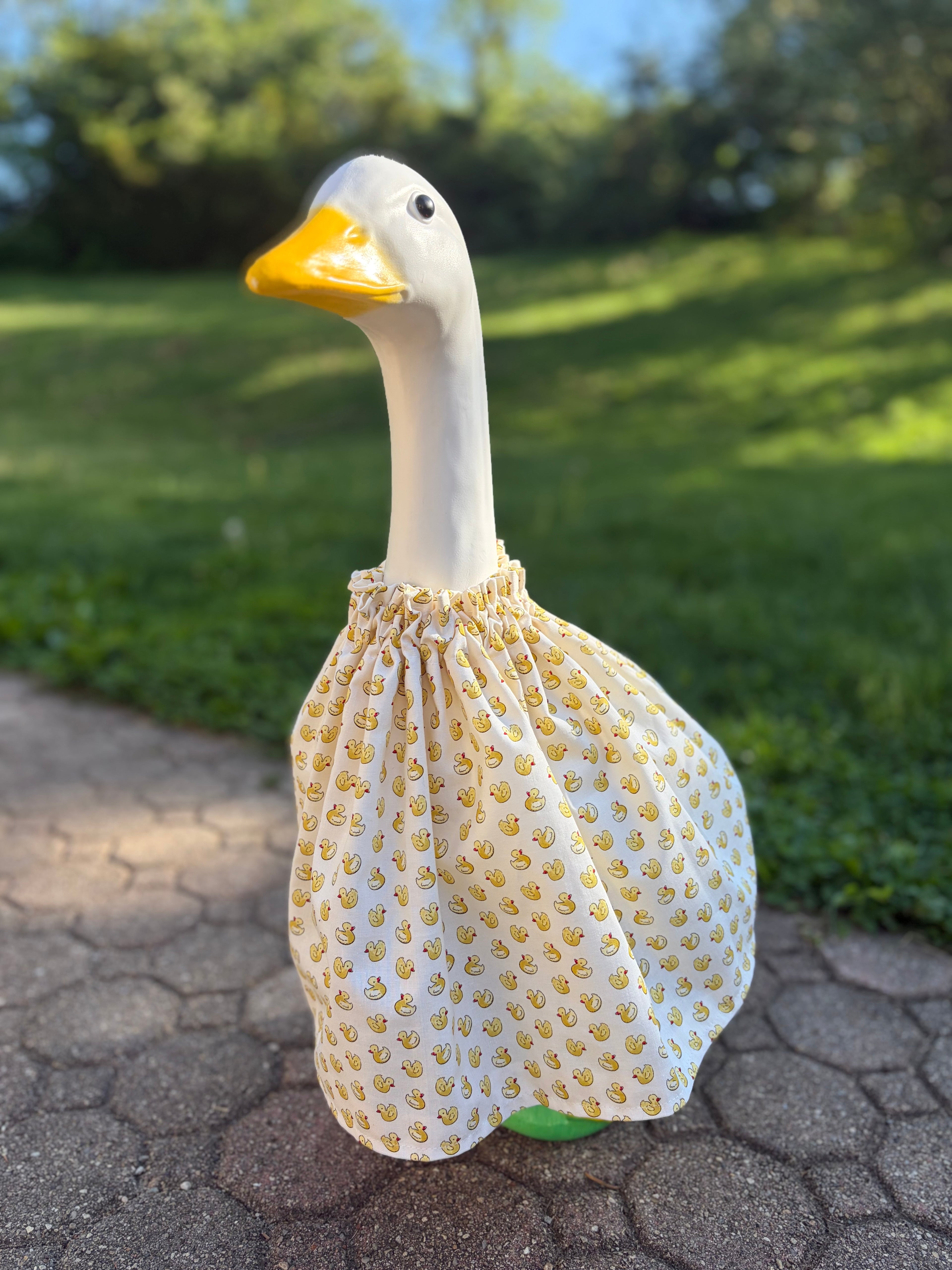 Porch goose with a rubber duck pattern dress
