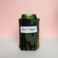 camouflage can cooler with a label on a pink background