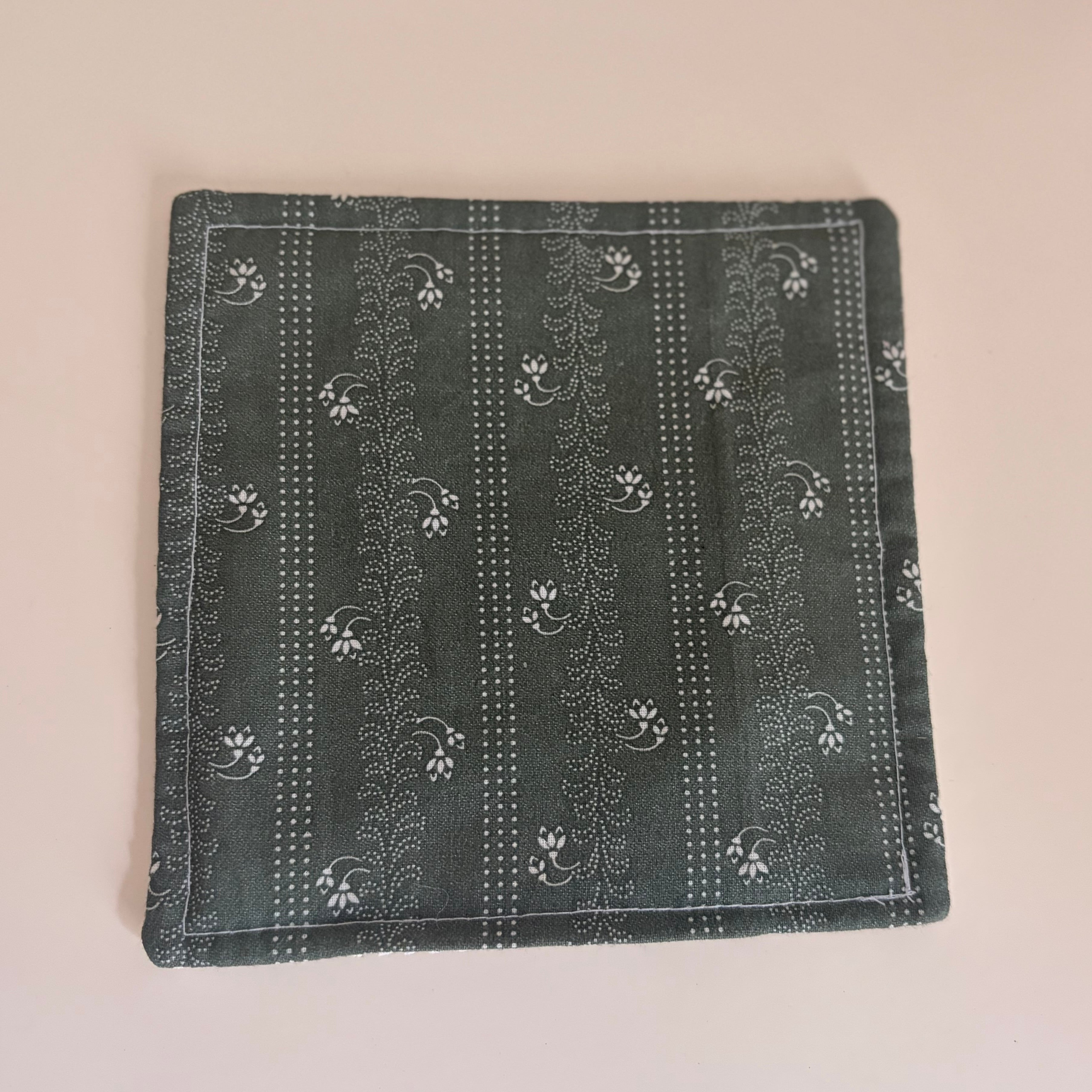 dark green fabric jar gripper on white background
