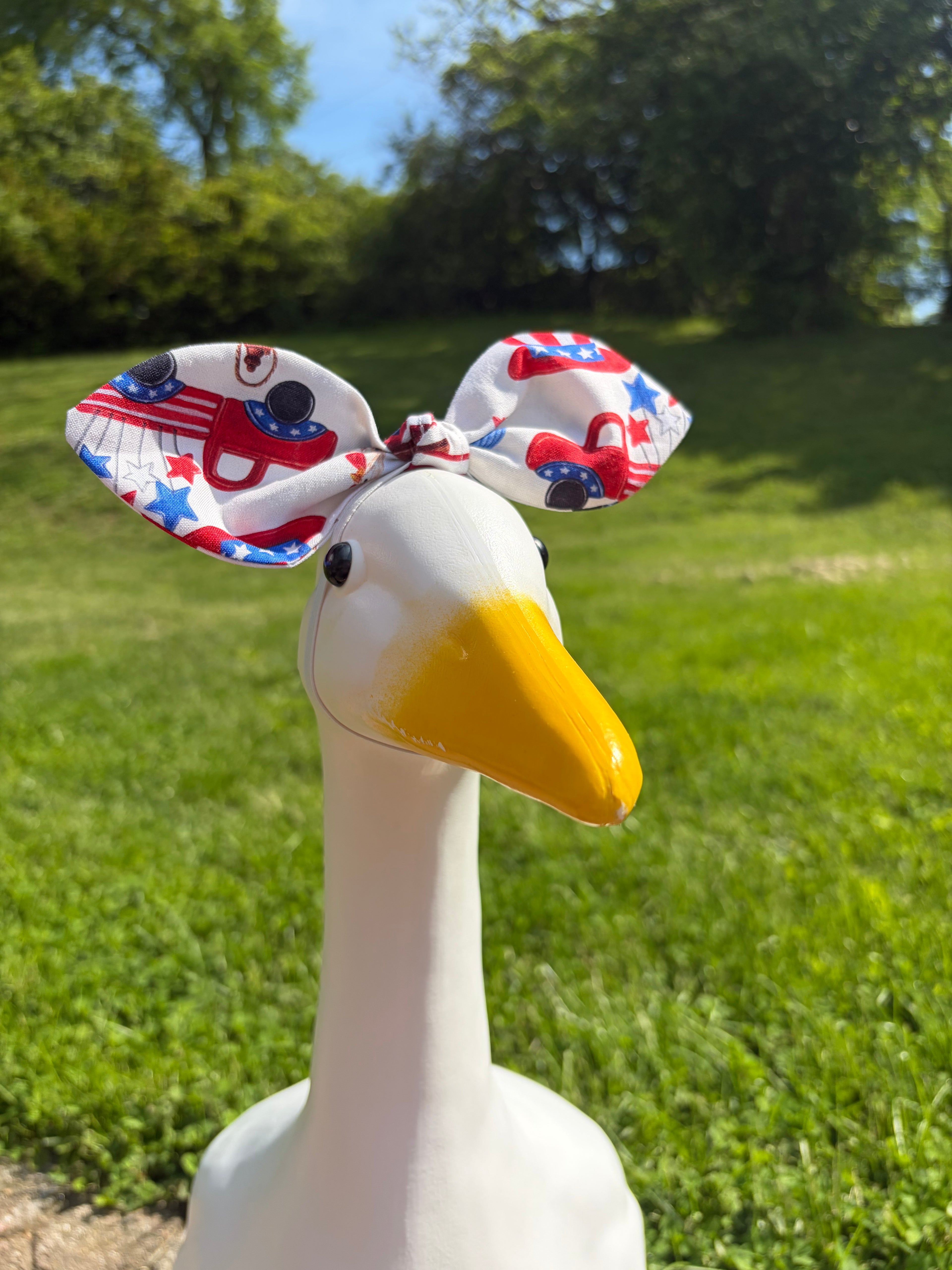 porch goose with memorial day themed bow