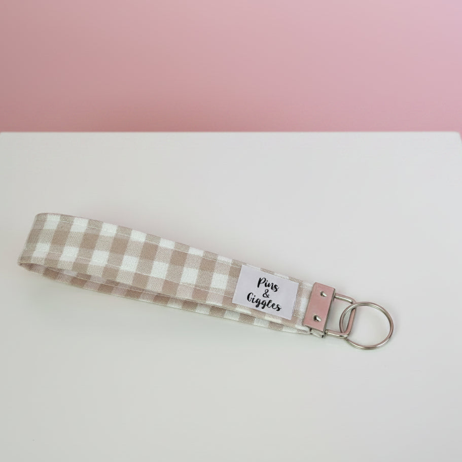 Checkered keychain on a white surface